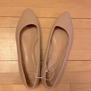 A new day pointed tan/cream colored flats